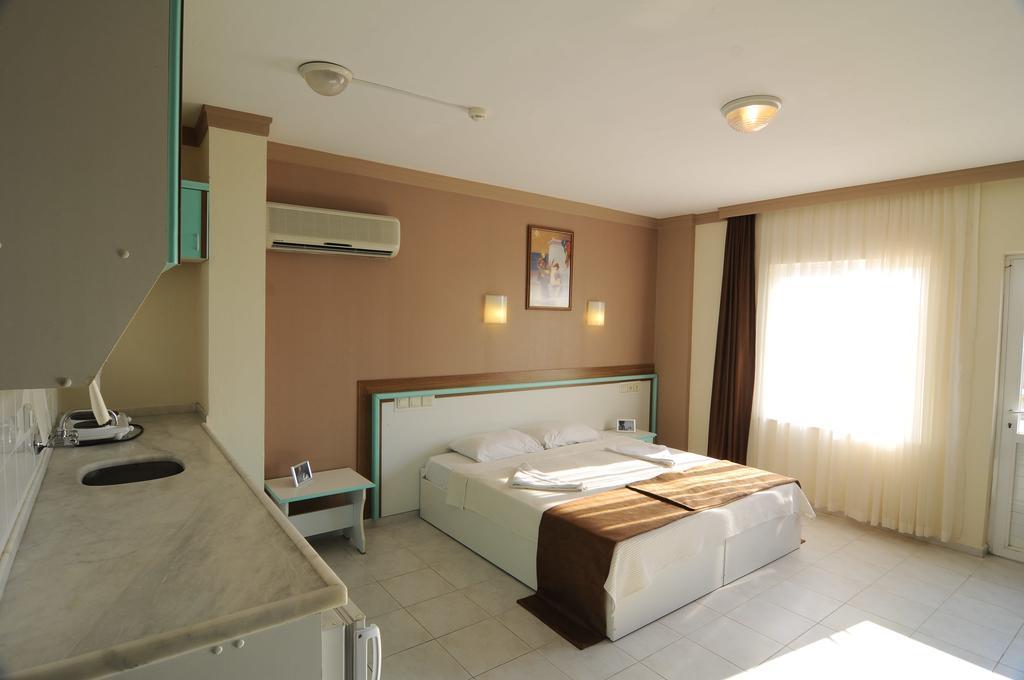 Altinbas Apart Hotel Кушадасы Экстерьер фото